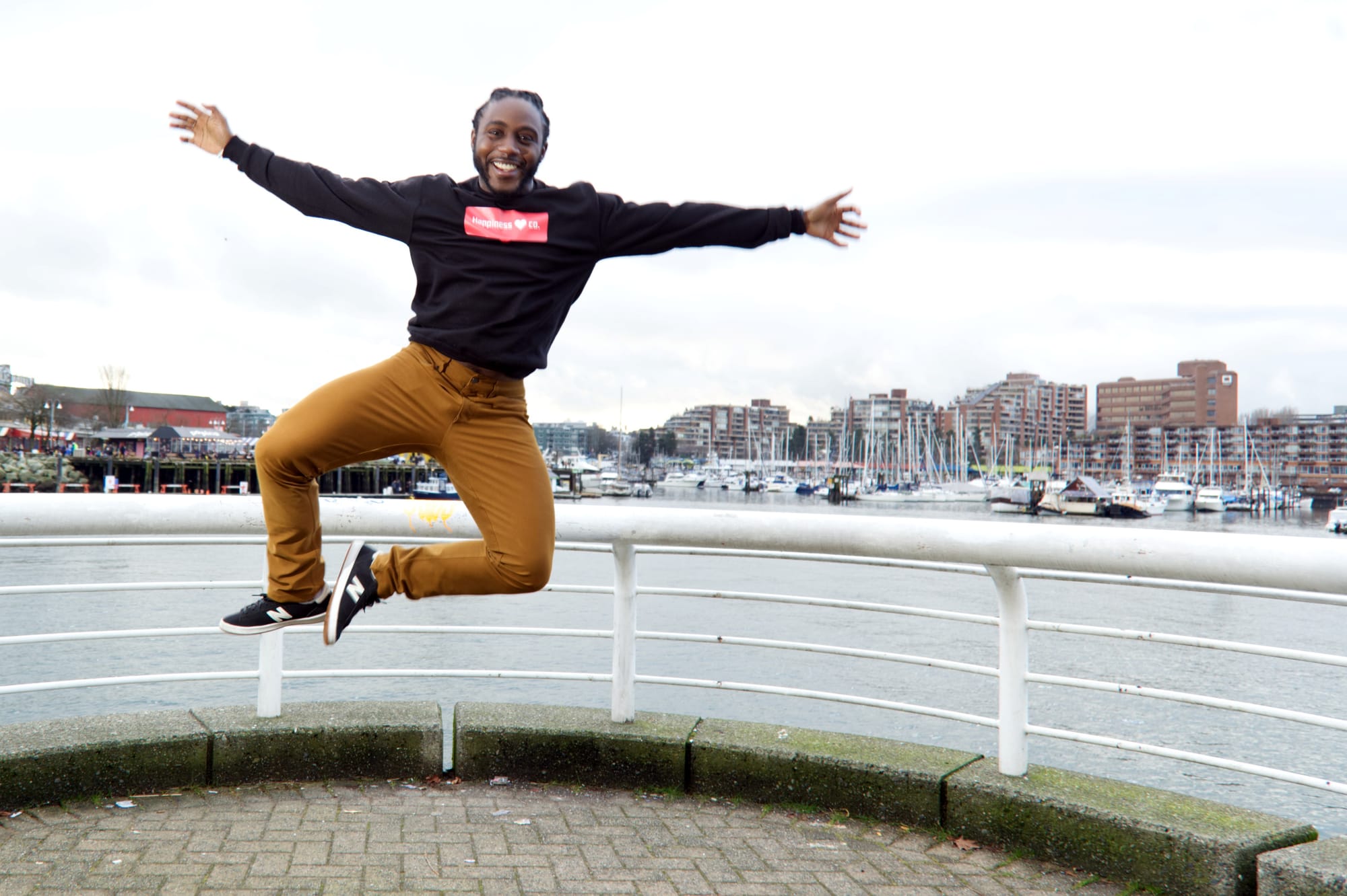 Chris jumping in the air happy