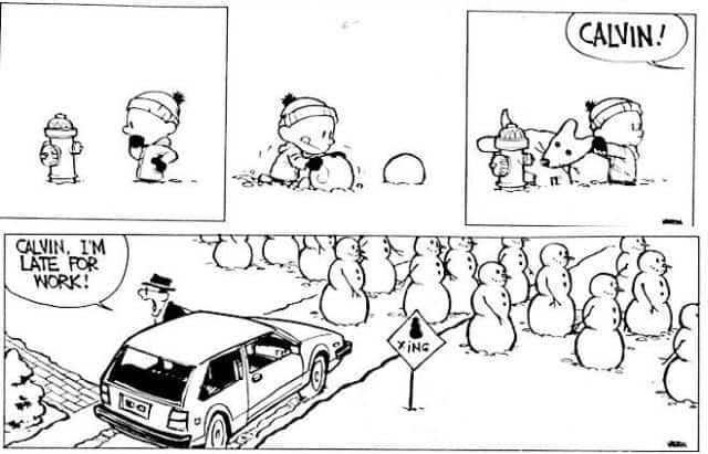 Photo of Calvin building a snowman